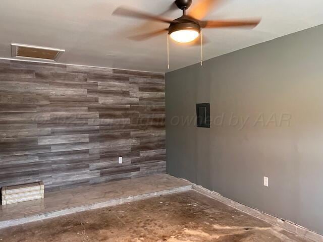 204 SE 15th Ave, Perryton, TX 79070 - empty room with ceiling fan and attic access