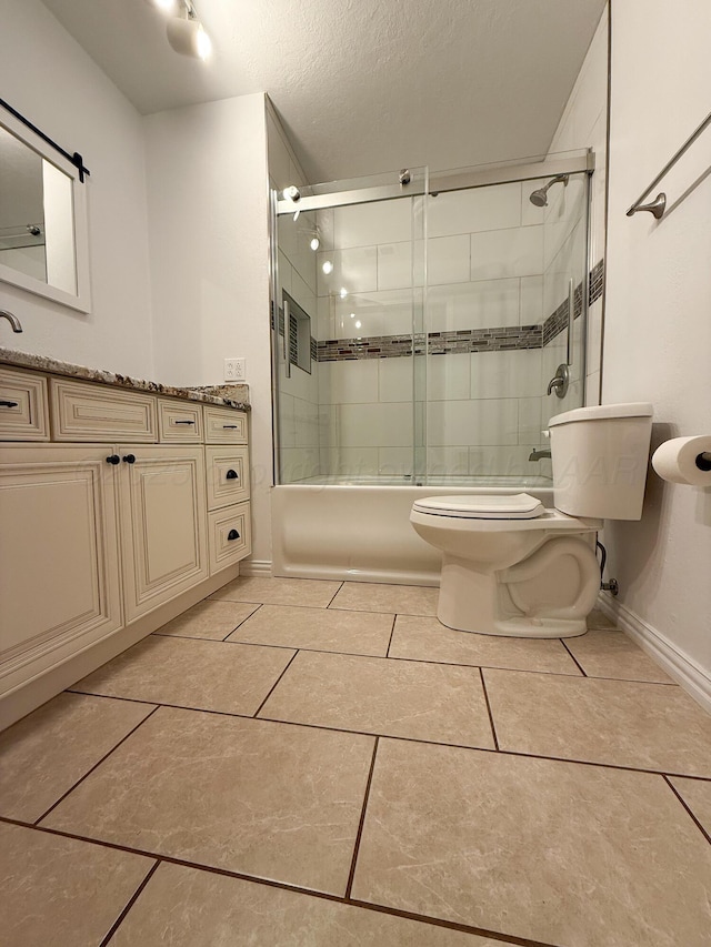 219 Kiekbusch St, Borger, TX 79007 - full bath with toilet, enclosed tub / shower combo, baseboards, tile patterned flooring, and vanity