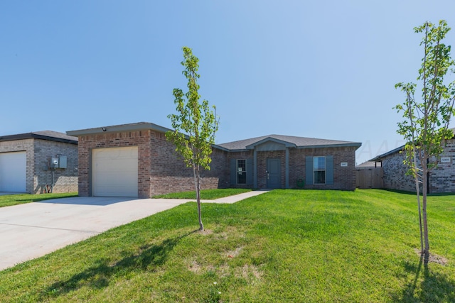 5007 Ratliff St, Amarillo, TX 79118 - ranch-style home with an attached garage, brick siding, a front lawn, and driveway