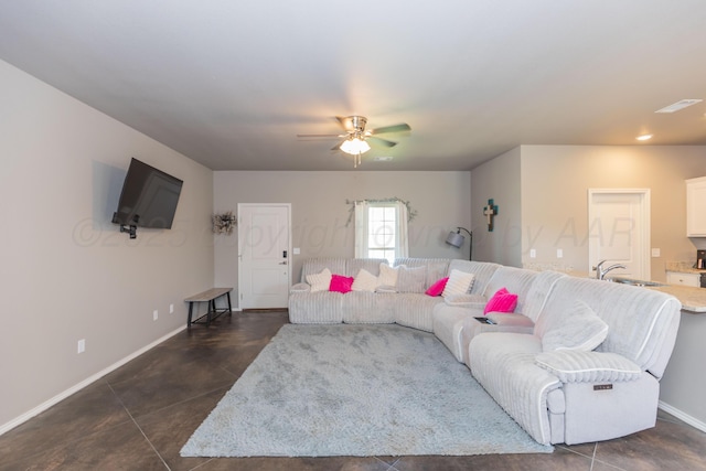 5007 Ratliff St, Amarillo, TX 79118 - living room with a ceiling fan, recessed lighting, and dark tile patterned floors