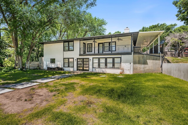 514 Melody Ln, Amarillo, TX 79118 - back of house with a ceiling fan, a chimney, and a balcony