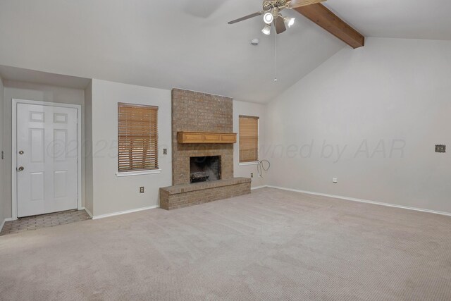 unfurnished living room featuring a ceiling fan, light colored carpet, baseboards, and a brick fireplace