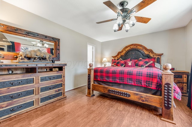 bedroom featuring ceiling fan and wood finished floors