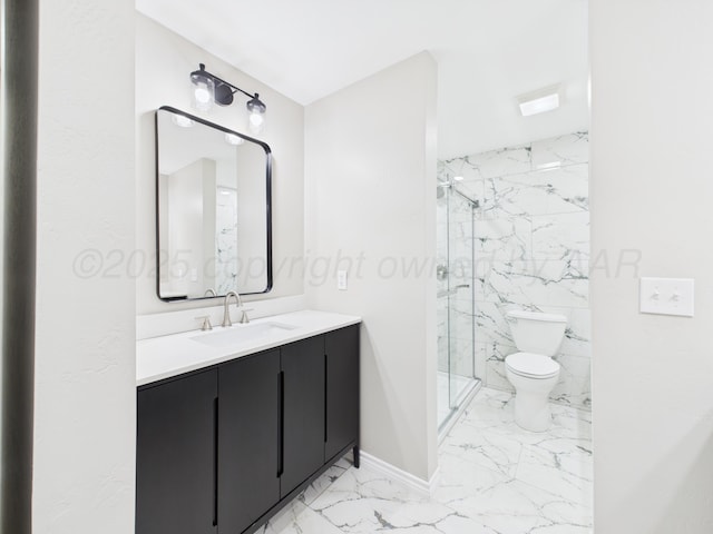 bathroom featuring baseboards, marble finish floor, a marble finish shower, toilet, and vanity