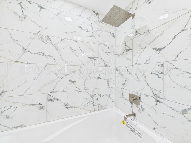 bathroom featuring shower / bathtub combination