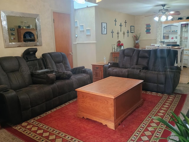 living area with ceiling fan