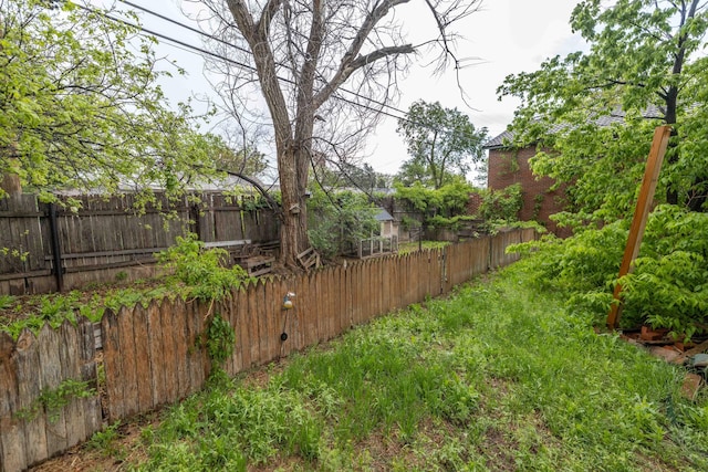 view of yard with fence