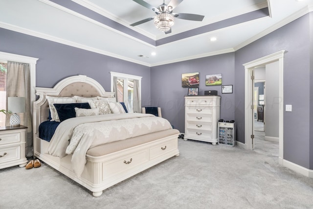 1918 Arroya Rd, Dalhart, TX 79022 - bedroom featuring ornamental molding, a tray ceiling, light carpet, and baseboards