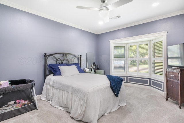1918 Arroya Rd, Dalhart, TX 79022 - bedroom featuring light colored carpet, visible vents, ornamental molding, a ceiling fan, and baseboards