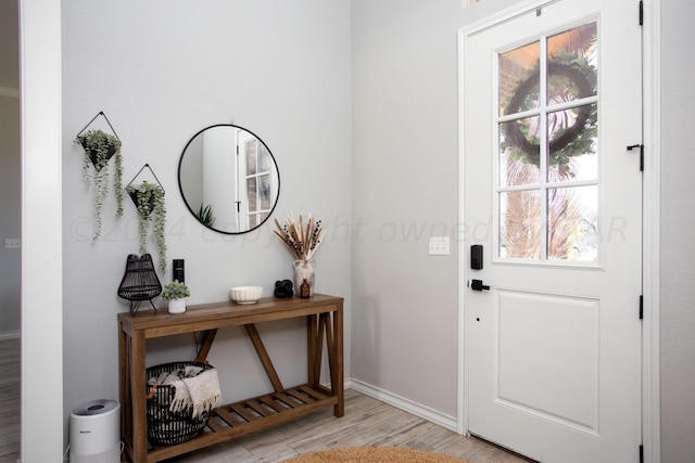 entryway with light wood-type flooring