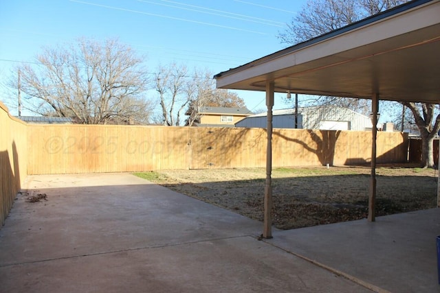 view of yard with a patio area and fence