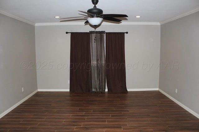 unfurnished room featuring baseboards, ornamental molding, and wood finished floors