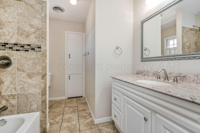 bathroom with vanity, tub / shower combination, tile patterned flooring, baseboards, and visible vents