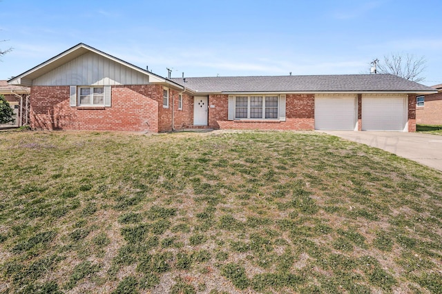 ranch-style home with brick siding, driveway, a garage, and a front lawn