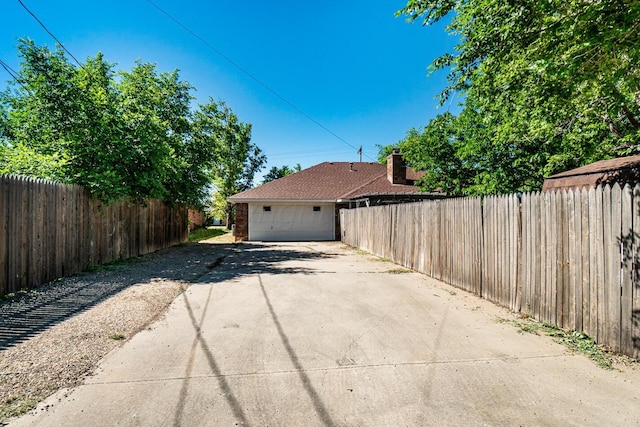 4208 Alamo Rd, Amarillo, TX 79110 - view of home's exterior featuring driveway and brick siding