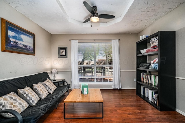 4208 Alamo Rd, Amarillo, TX 79110 - living area featuring wood finished floors, ceiling fan, baseboards, and a textured wall