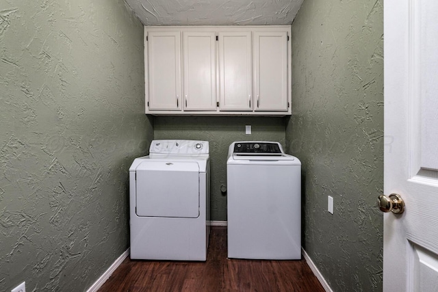 4208 Alamo Rd, Amarillo, TX 79110 - laundry room with cabinet space, dark wood-style floors, baseboards, and washing machine and clothes dryer