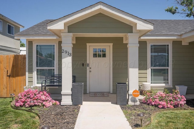 2913 Wichita Ave, Amarillo, TX 79107 - doorway to property featuring a porch and a shingled roof