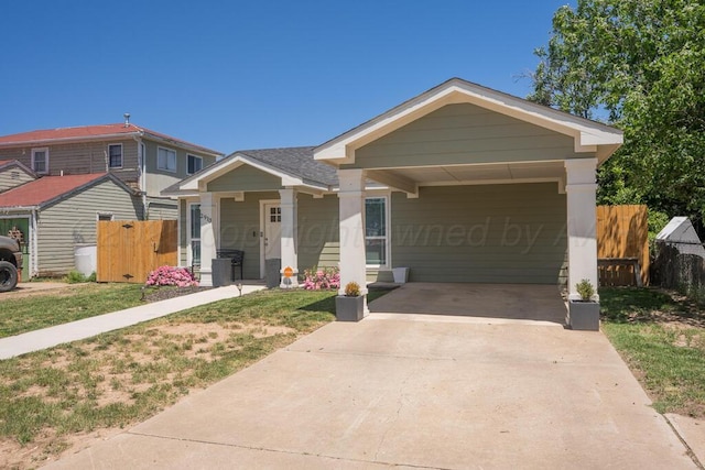 2913 Wichita Ave, Amarillo, TX 79107 - view of front of house with driveway and a carport