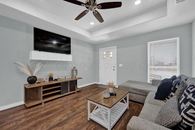 2913 Wichita Ave, Amarillo, TX 79107 - living area with baseboards, dark wood-type flooring, a tray ceiling, a ceiling fan, and recessed lighting