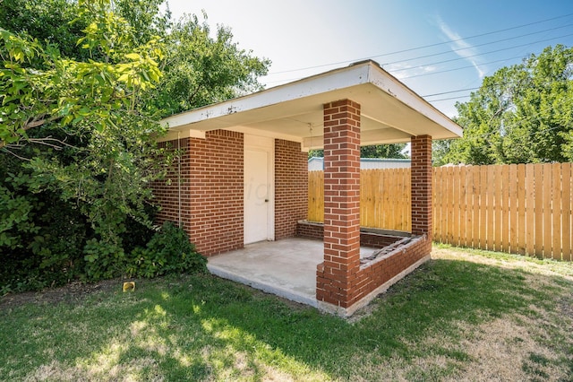 view of outdoor structure with fence