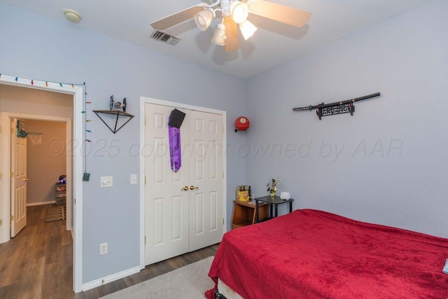 6205 S Bonham St, Amarillo, TX 79118 - bedroom with wood finished floors, a closet, and a ceiling fan