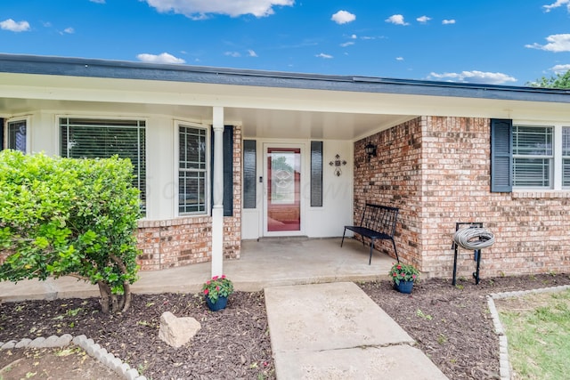 6308 Dartmouth St, Amarillo, TX 79109 - property entrance with brick siding and covered porch
