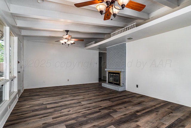 unfurnished living room with beamed ceiling, a ceiling fan, and wood finished floors
