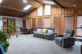 110 Dallam Ave, Dumas, TX 79029 - community lobby featuring high vaulted ceiling, beam ceiling, and wood walls