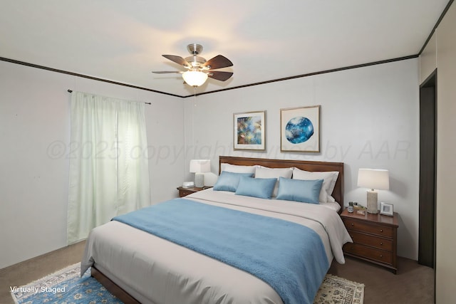 707 Trice St, Claude, TX 79019 - carpeted bedroom featuring a ceiling fan and ornamental molding