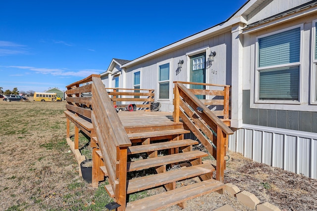 707 Trice St, Claude, TX 79019 - entrance to property featuring a yard and a wooden deck