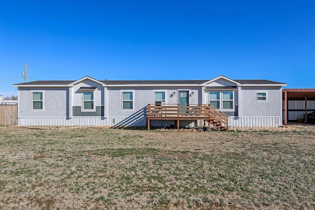 707 Trice St, Claude, TX 79019 - rear view of property featuring a yard and a deck