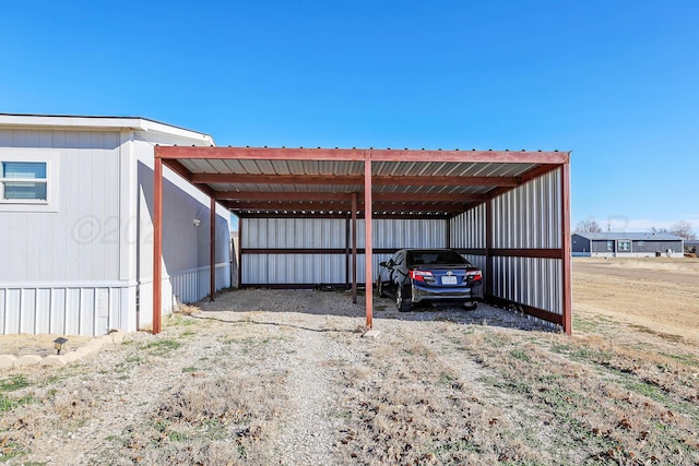 707 Trice St, Claude, TX 79019 - view of vehicle parking with a carport and driveway