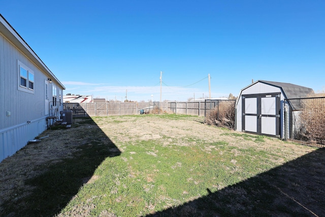 707 Trice St, Claude, TX 79019 - view of yard with a fenced backyard, an outbuilding, and a storage unit