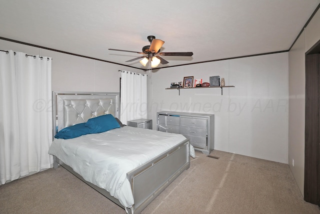 707 Trice St, Claude, TX 79019 - bedroom featuring light carpet, ornamental molding, and ceiling fan