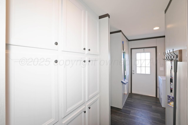 707 Trice St, Claude, TX 79019 - corridor with recessed lighting, washer / dryer, ornamental molding, and dark wood finished floors
