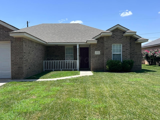 4016 S Williams St, Amarillo, TX 79118 - view of front of home featuring a porch, a front yard, brick siding, and a shingled roof