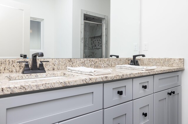 4108 Inez Way, Amarillo, TX 79124 - bathroom featuring double vanity and a shower stall