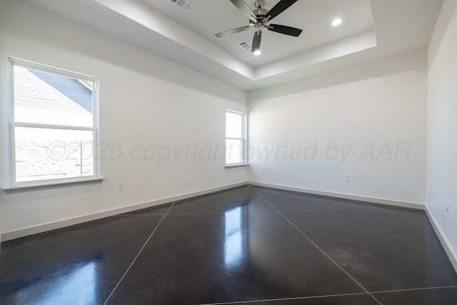 4108 Inez Way, Amarillo, TX 79124 - empty room featuring baseboards, concrete flooring, ceiling fan, recessed lighting, and a raised ceiling