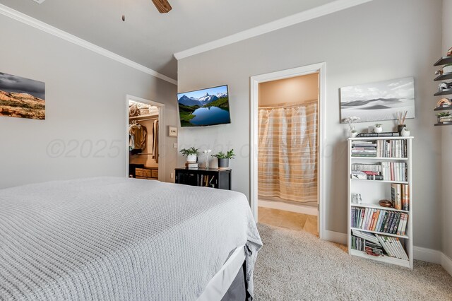 5013 Gloster St, Amarillo, TX 79118 - carpeted bedroom featuring ornamental molding, a walk in closet, ensuite bathroom, a closet, and ceiling fan