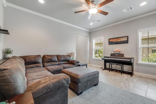 5013 Gloster St, Amarillo, TX 79118 - living area with plenty of natural light, a ceiling fan, recessed lighting, light tile patterned floors, and crown molding