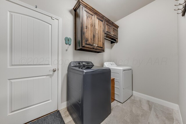 5013 Gloster St, Amarillo, TX 79118 - laundry room with separate washer and dryer and cabinet space