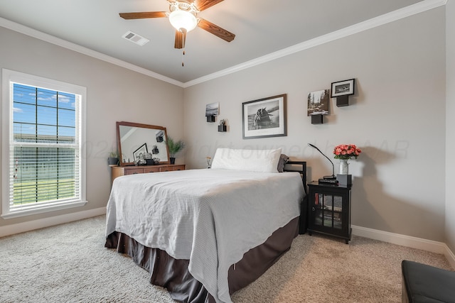 5013 Gloster St, Amarillo, TX 79118 - carpeted bedroom featuring ornamental molding, multiple windows, and a ceiling fan