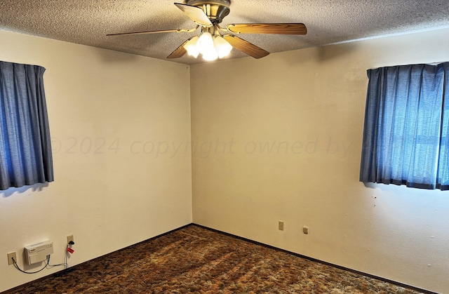 106 Middle St, Balko, OK 73931 - carpeted spare room featuring a textured ceiling and ceiling fan