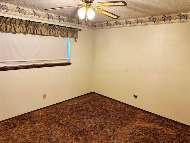 106 Middle St, Balko, OK 73931 - empty room with carpet, a textured ceiling, and ceiling fan