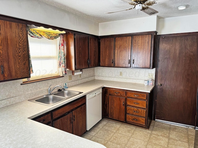 106 Middle St, Balko, OK 73931 - kitchen with tasteful backsplash, a textured ceiling, white dishwasher, sink, and ceiling fan