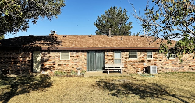 106 Middle St, Balko, OK 73931 - rear view of property with a lawn and central AC