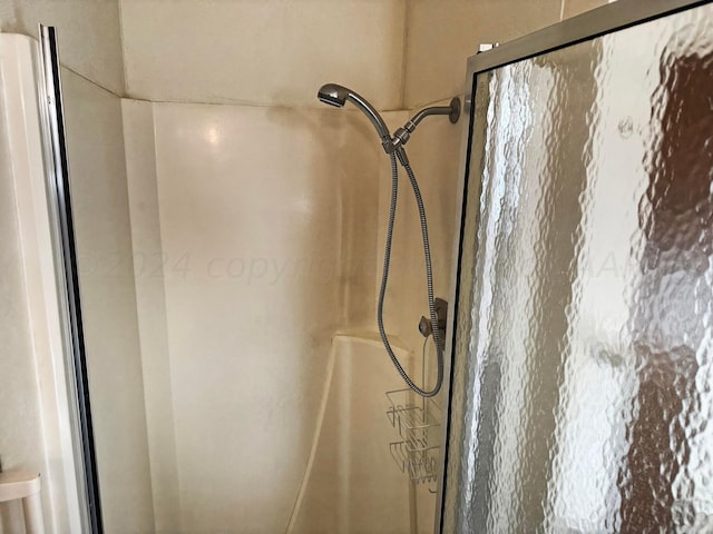 106 Middle St, Balko, OK 73931 - room details featuring a shower with door
