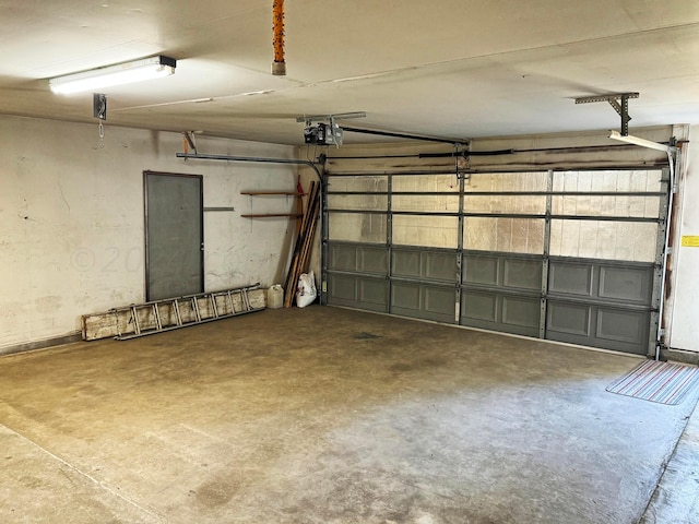 106 Middle St, Balko, OK 73931 - garage featuring a garage door opener