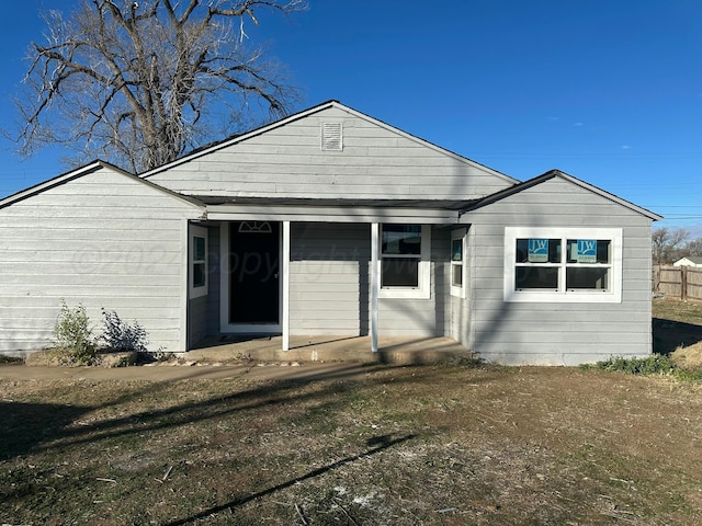 view of front of property with a front lawn